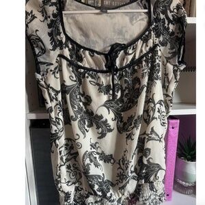 White/cream and black floral patterned blouse
